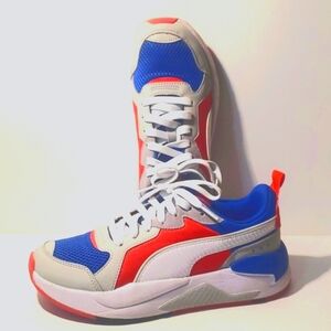 Puma sneakers size 7 red, white, and blue